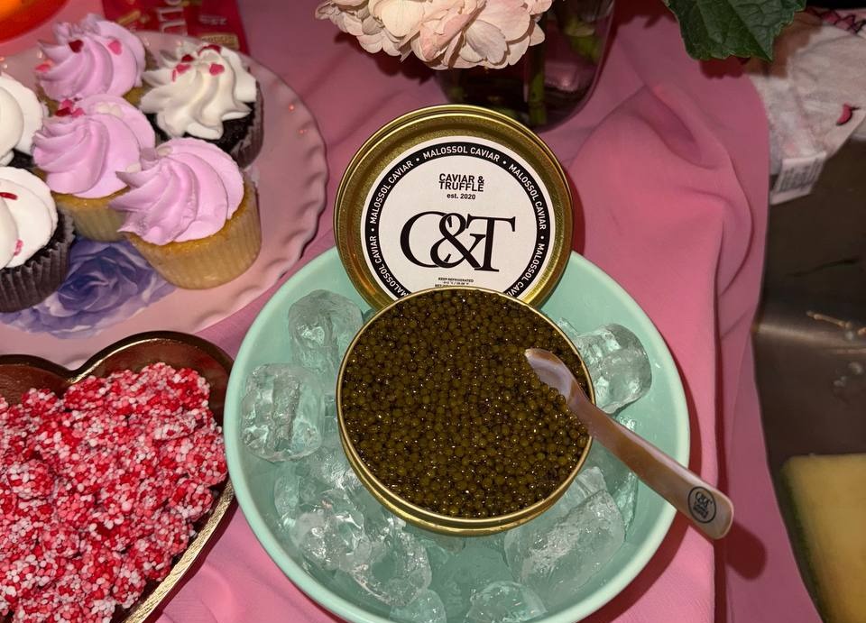 Caviar served on a private party table with champagne