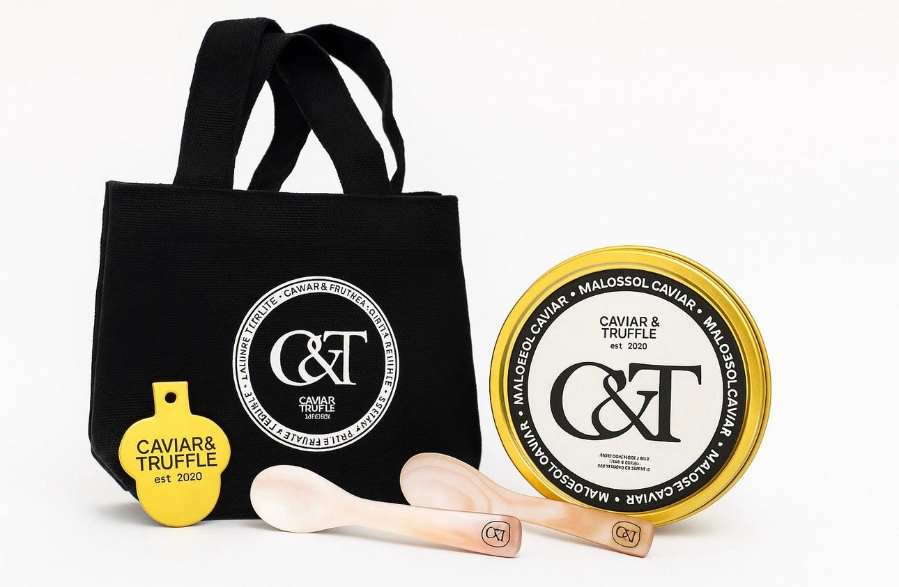 Caviar and Truffle branded tote bag with caviar tin and mother of pearl spoons